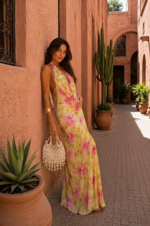 Vestido Brisa · Largo floral de escote halter