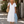 Vestido Soledad · Midi de cuello en V con volantes