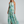 Vestido Noelia · Maxi floral plisado de cuello halter