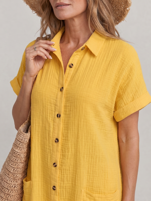 Vestido Justa · A la rodilla con bolsillos