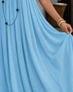 Vestido Yolanda · Midi de tirantes vaporoso