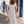 Vestido Rita · Midi de rayas con cuello lazo