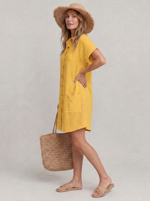 Vestido Justa · A la rodilla con bolsillos