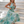 Vestido Noelia · Maxi floral plisado de cuello halter