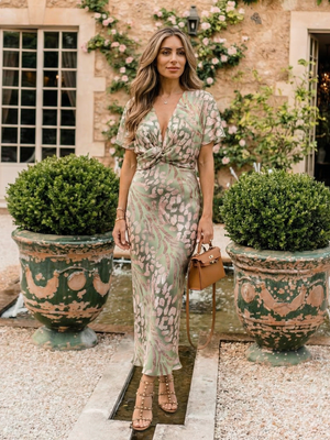 Vestido Feliciana · Midi de cuello en V con nudo