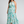 Vestido Noelia · Maxi floral plisado de cuello halter