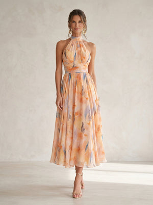 Vestido Lucena · Cuello halter con estampado de acuarela