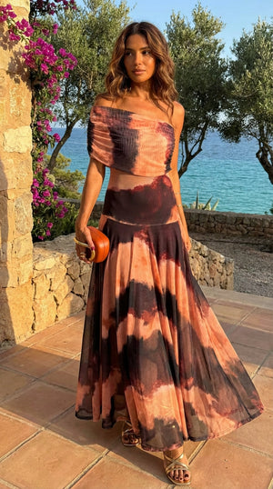Vestido Carmina · Largo con estampado naranja y marrón