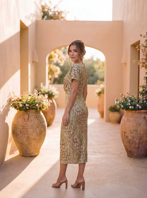 Vestido Lina · Midi con nudo central y caída fluida