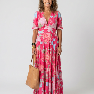 Vestido Marisol · Midi floral con escote en V