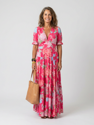 Vestido Marisol · Midi floral con escote en V