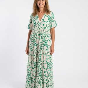 Vestido Estrella · Midi floral con escote en V