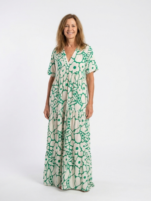 Vestido Estrella · Midi floral con escote en V