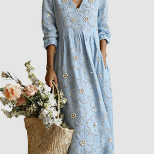 Vestido Nayara · Midi floral de manga larga