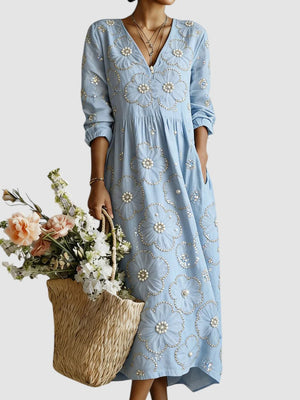 Vestido Nayara · Midi floral de manga larga