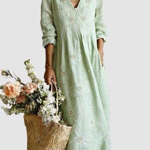 Vestido Nayara · Midi floral de manga larga