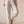 Pantalón Mencía · Recto de rayas con botones laterales