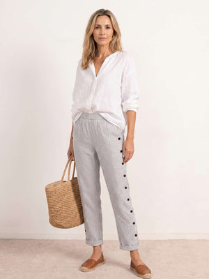 Pantalón Mencía · Recto de rayas con botones laterales