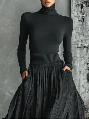 Conjunto Benita · Top de cuello alto y falda plisada