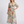 Vestido Olga · Midi floral de cintura fruncida