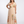 Vestido Araceli · Maxi floral plisado con escote en V