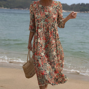 Vestido Melania · Maxi de cuello redondo