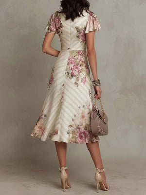 Vestido Teodora · Midi de satén floral